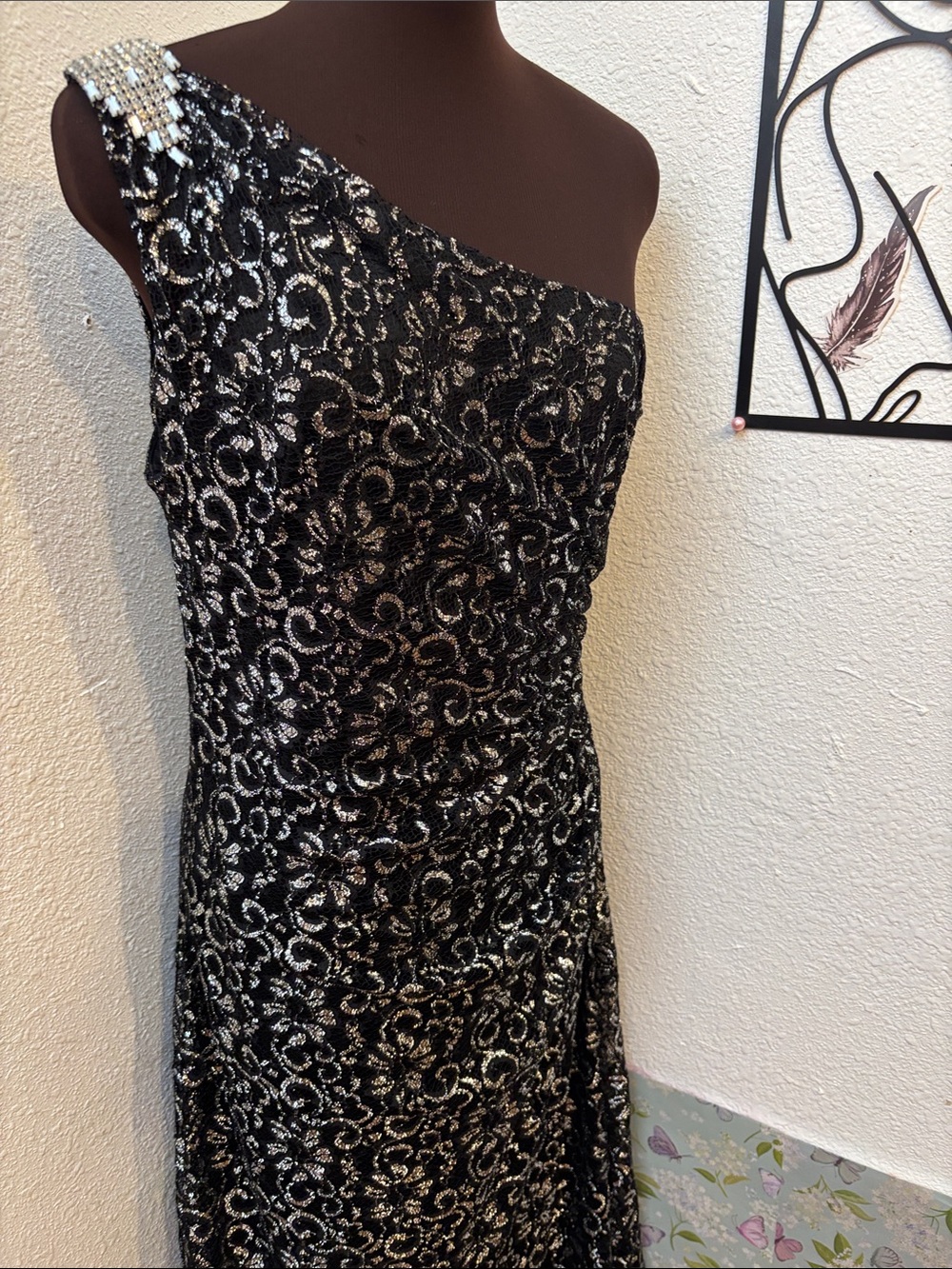 Calvin Klein black and silver metallic floral one-shoulder evening gown. Size 12